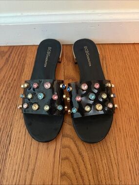 BCBGeneration Black Patent Slide Sandals with Multicolor Gem Studs